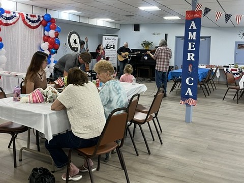 Group of seniors and live band Patriot Luncheon